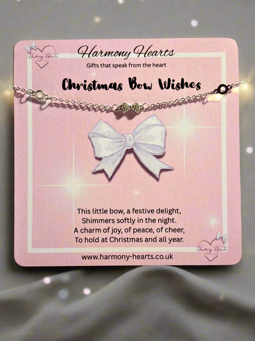 Bracelet with a bow pendant on a pink card from Harmony Hearts