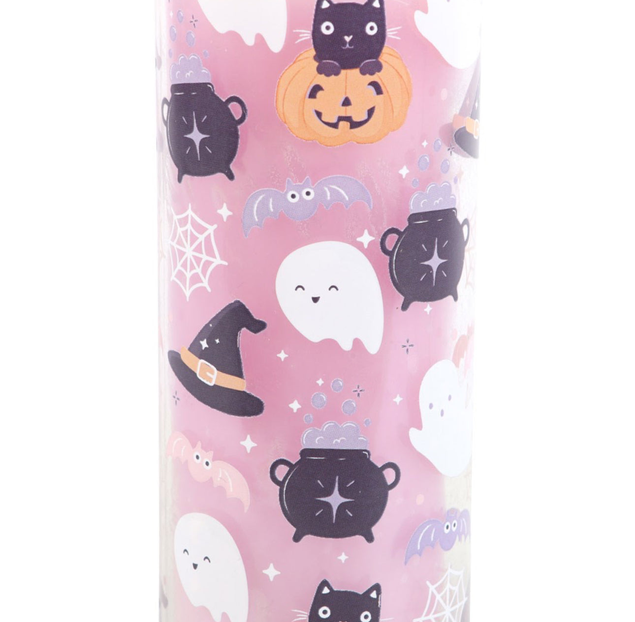 Candle with Halloween-themed design on a pink background
