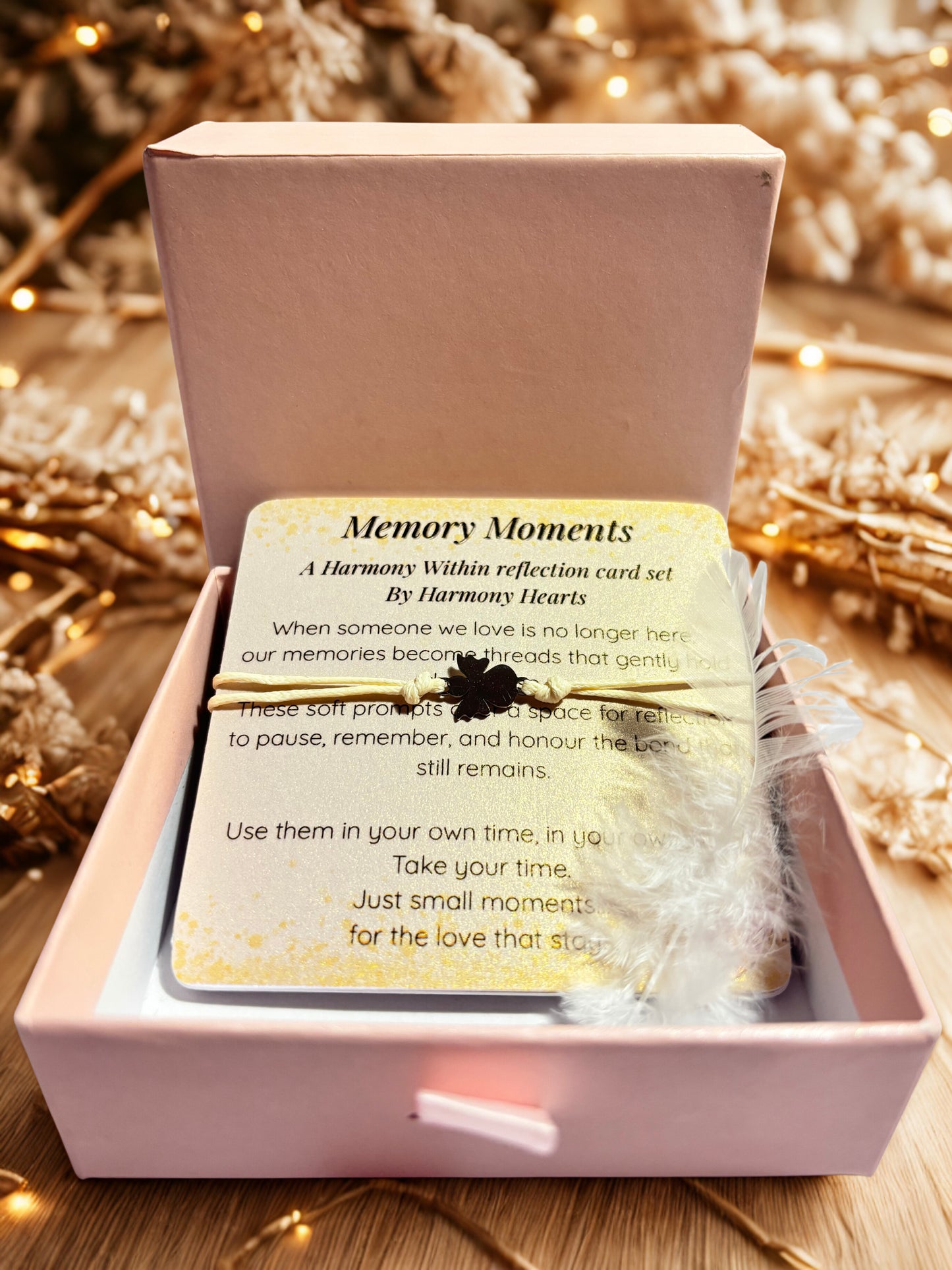 Memory Moments reflection card set in a pink box with decorative background