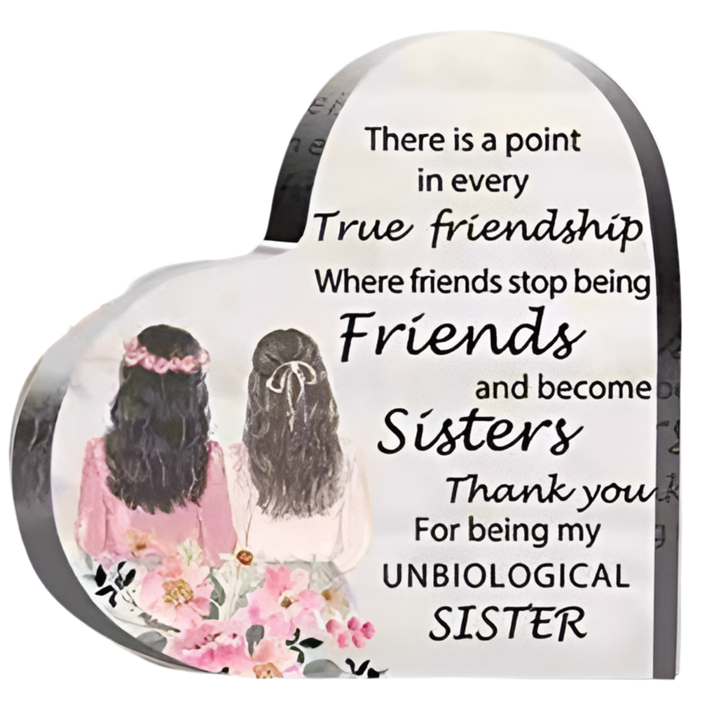 Heart-shaped acrylic keepsake with an illustration of two friends and text celebrating their friendship, along with floral accents.
