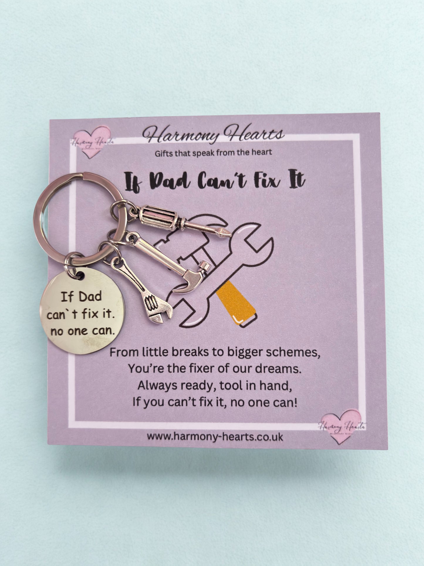 Keychain with tools on a card from Harmony Hearts