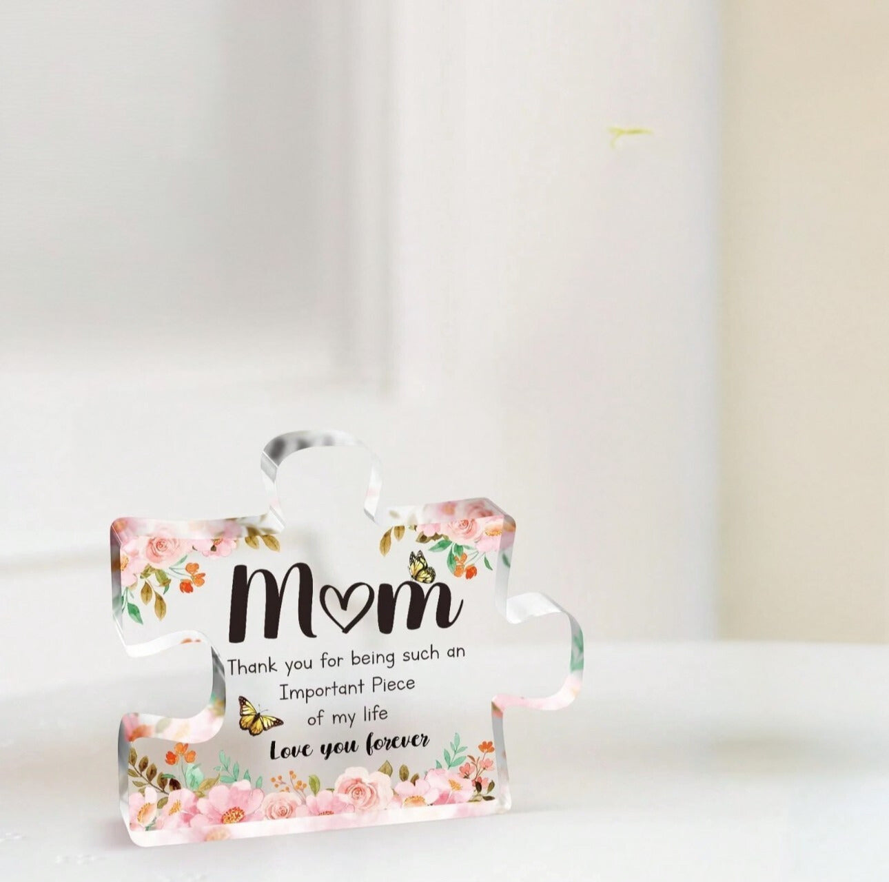 Decorative acrylic piece with floral design and text for Mom on a white background
