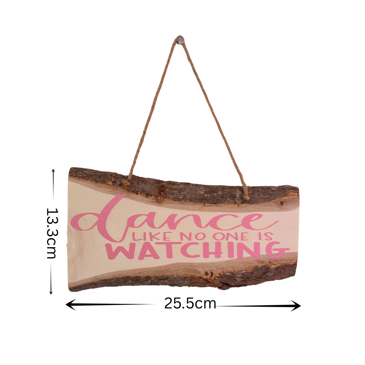 Wooden sign with 'dance like no one is watching' text and measurements on a white background