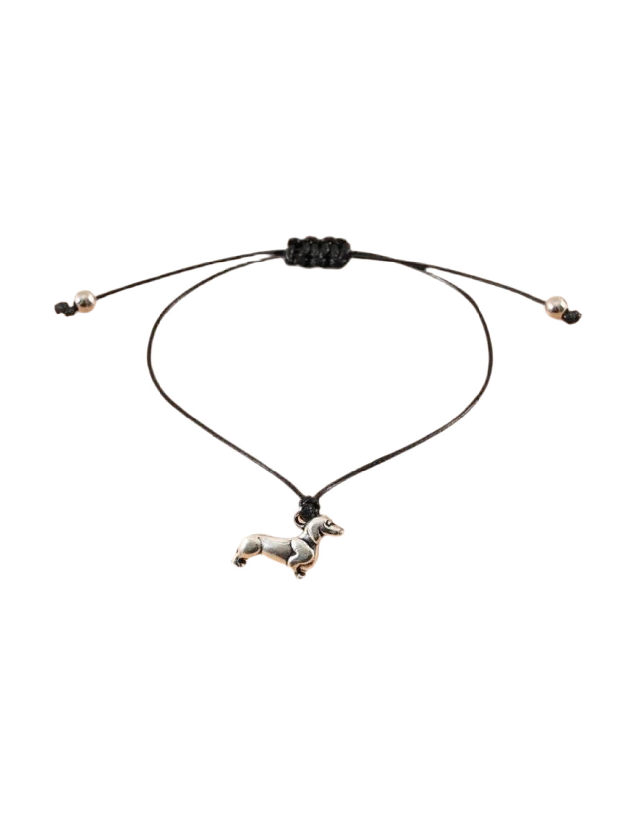“Pawsome Dachshund Wish Bracelet — a silver charm on black cord with a sweet wish card. A perfect little gift for sausage dog lovers & friends.”