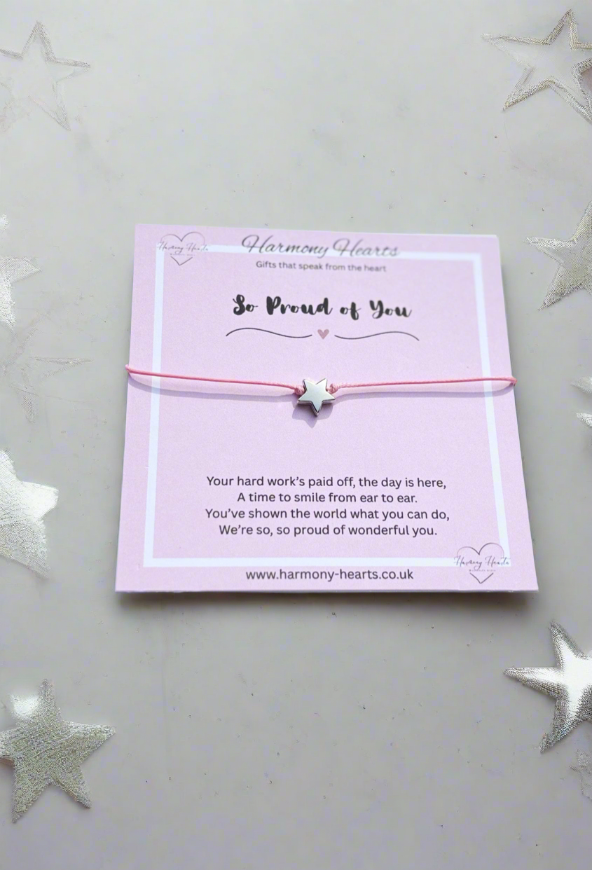 Pink card with a bracelet on a light gray background