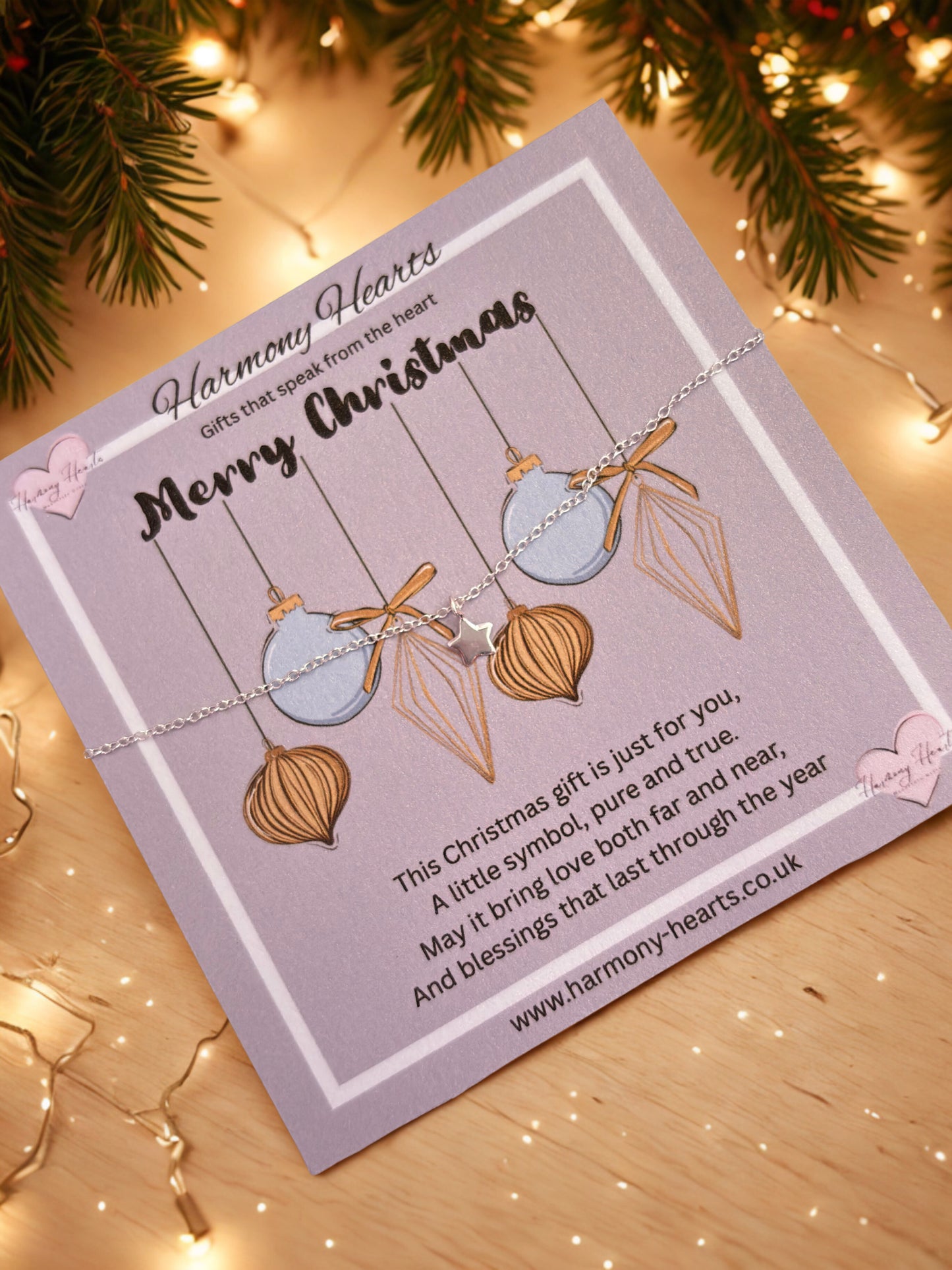 Bracelet on a card with Christmas decorations in the background