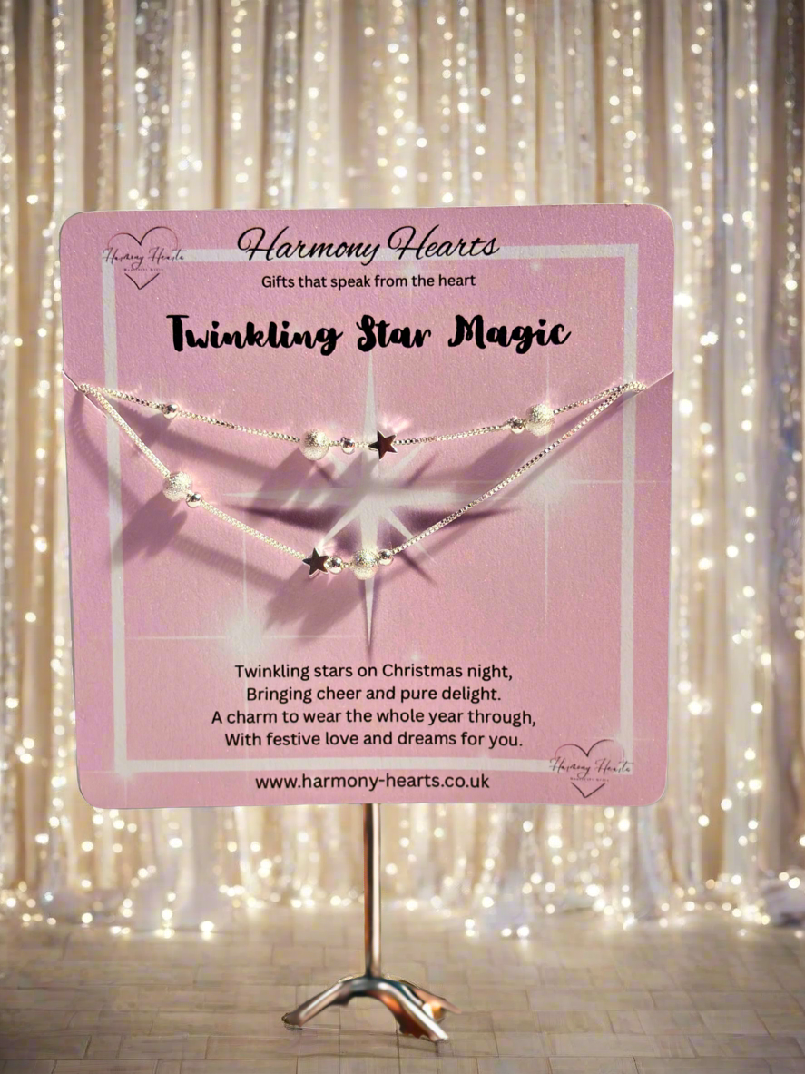 Bracelet on a pink card with 'Harmony Hearts' branding against a string of lights background