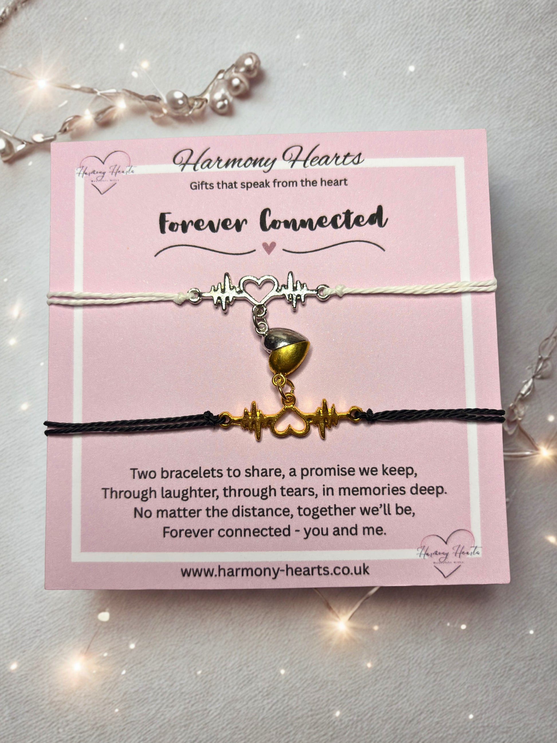 Two bracelets on a card with 'Harmony Hearts' branding and product description.