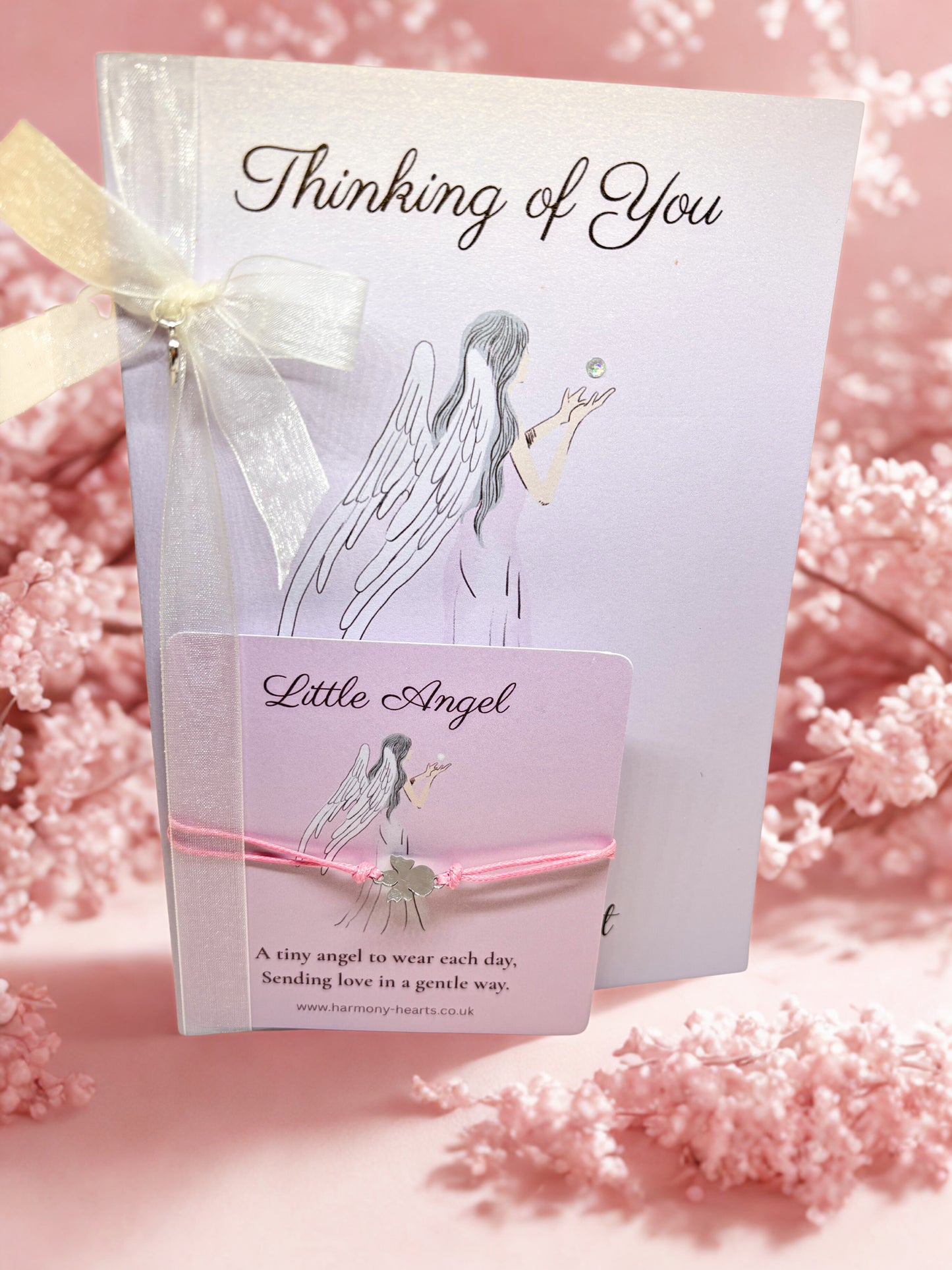 Thinking of you card with an angel illustration and matching bracelet card with an angel bracelet