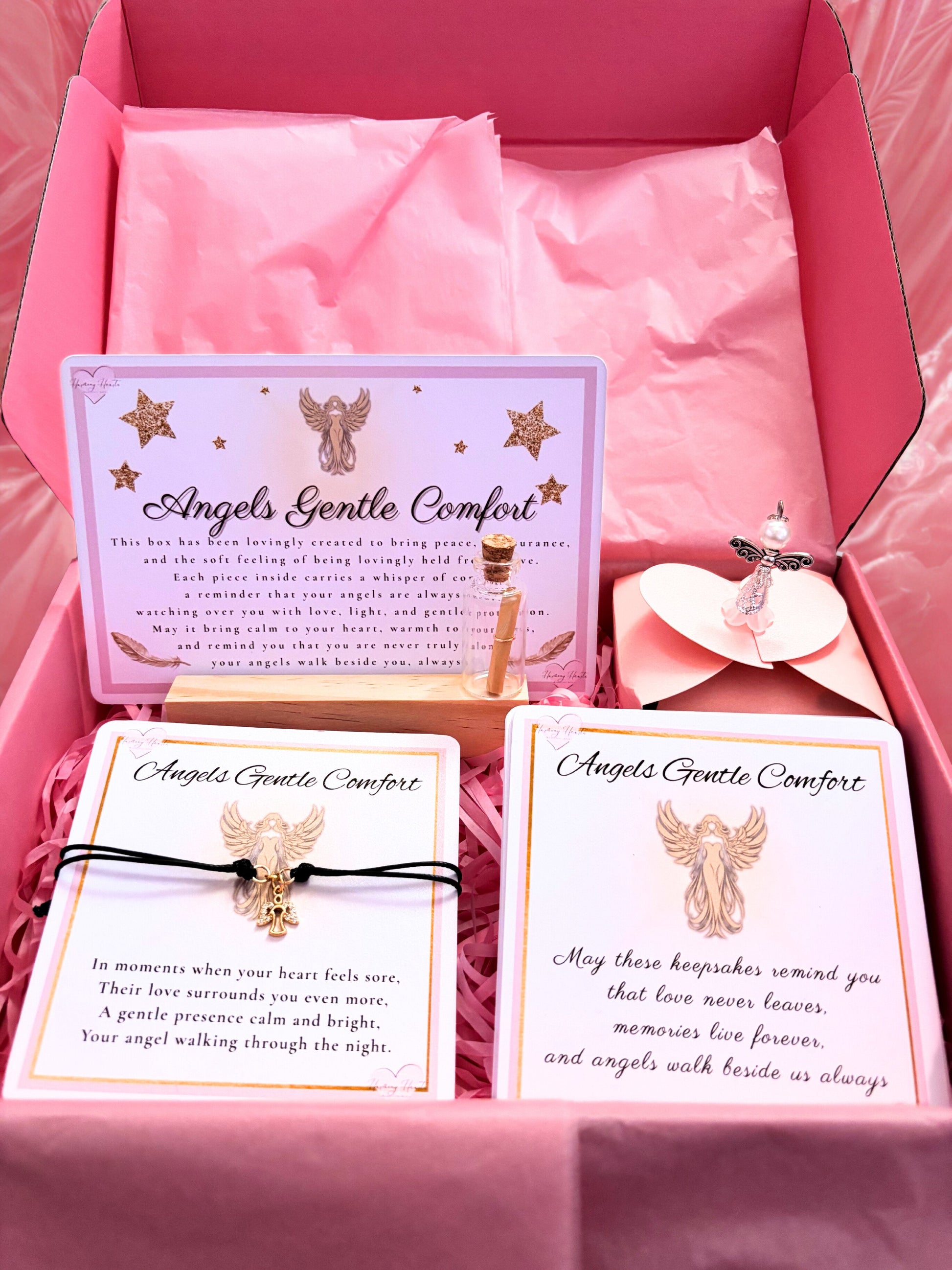Product set with 'Angels Gentle Comfort' jewelry and cards in a pink box.