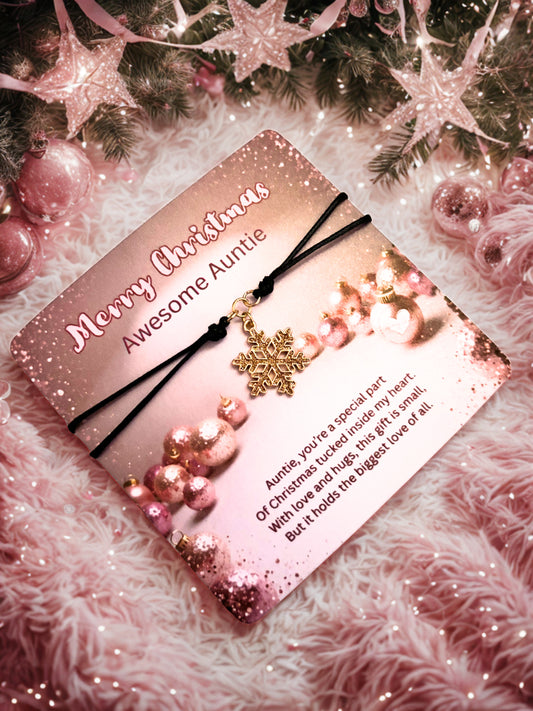 Gift card with decorative elements on a festive background and a snowflake bracelet