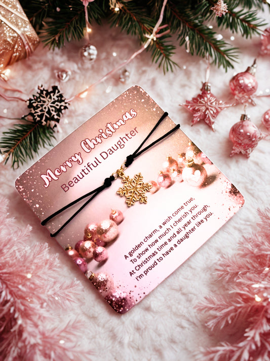 Christmas card with gold snowflake bracelet on a festive background