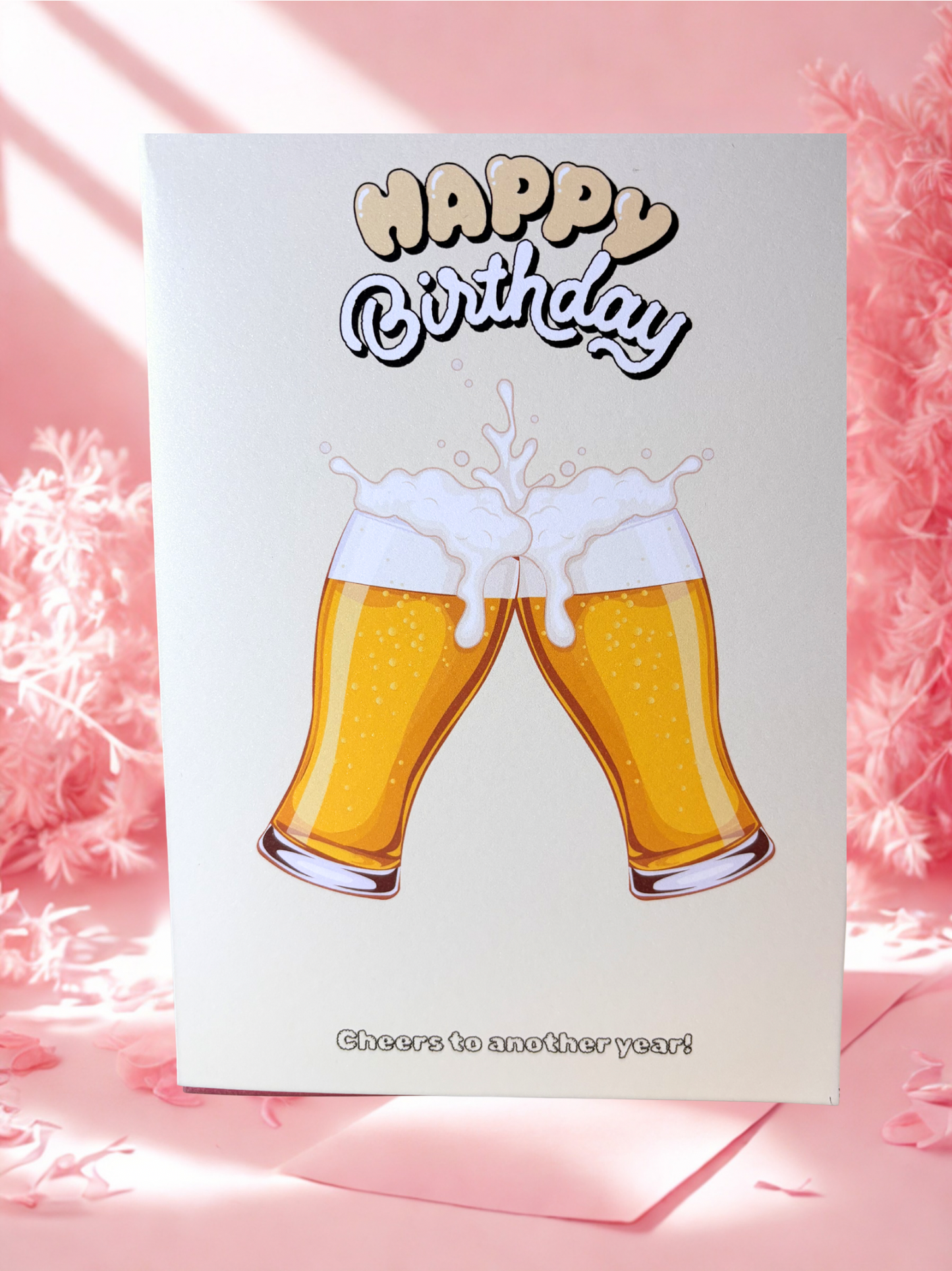 Birthday card with two beer glasses and 'Happy Birthday' text on a pink background