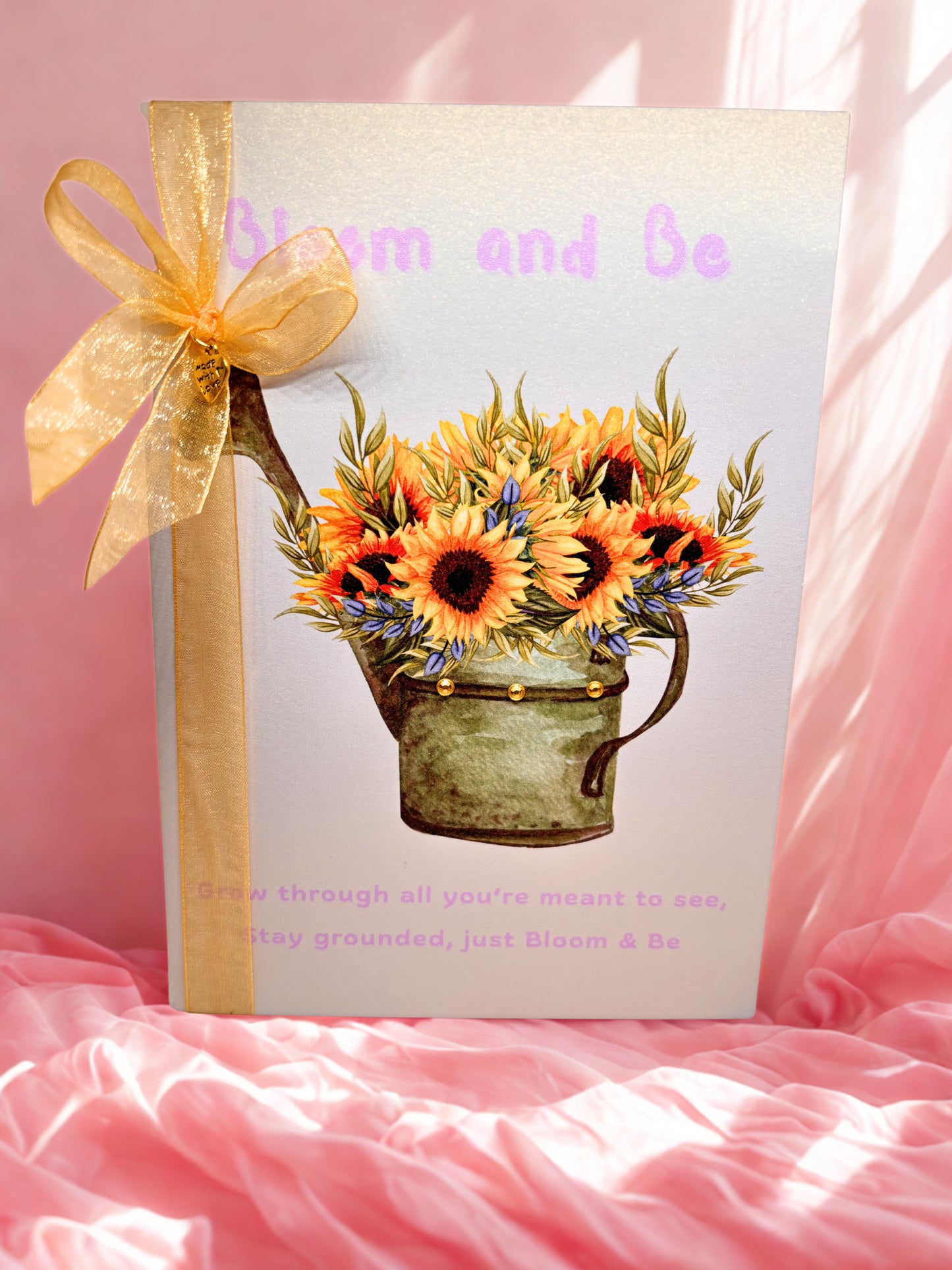 Greeting card with sunflower design and the words Bloom & Be