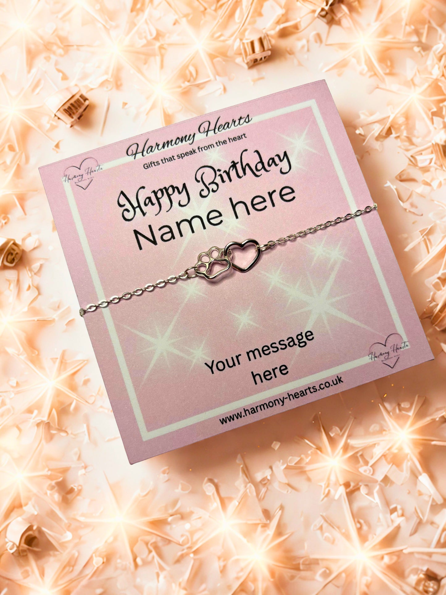 Bracelet on a personalized birthday card with decorative background