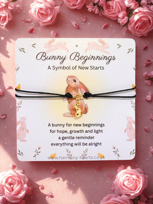 Bunny-themed bracelet on a card with floral background