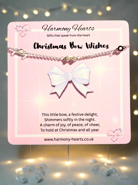 Bracelet with a bow on a pink card from Harmony Hearts against a softly glowing background.