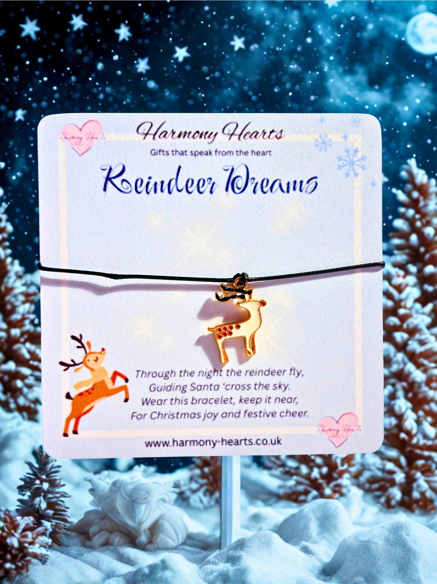 Bracelet packaging with reindeer design against a snowy background