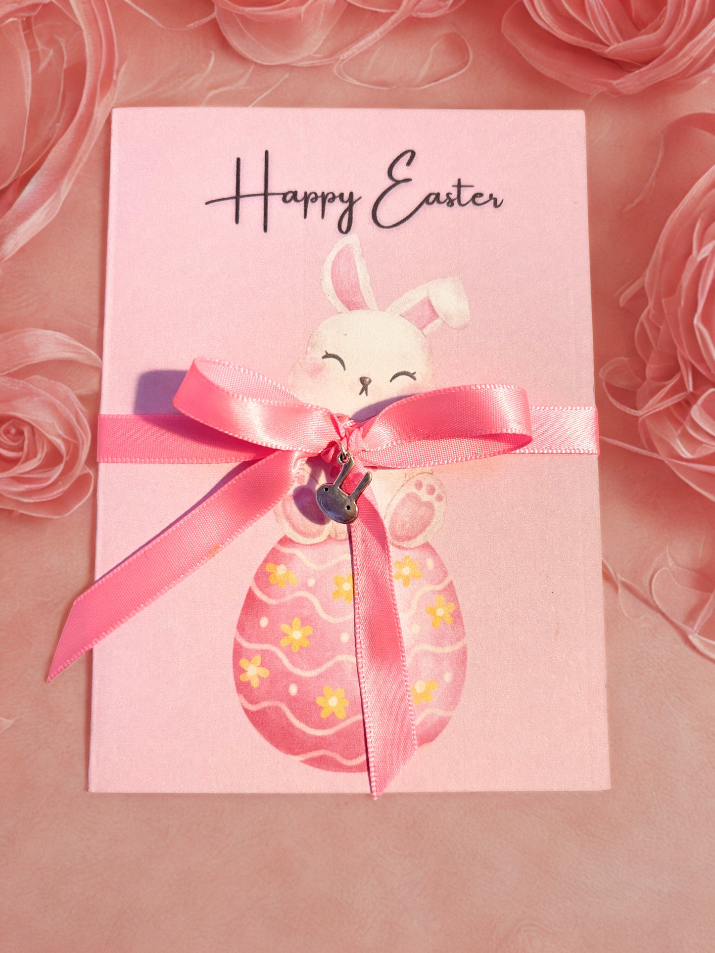 Set of pink Easter cards with a bunny and egg design on a pink floral background
