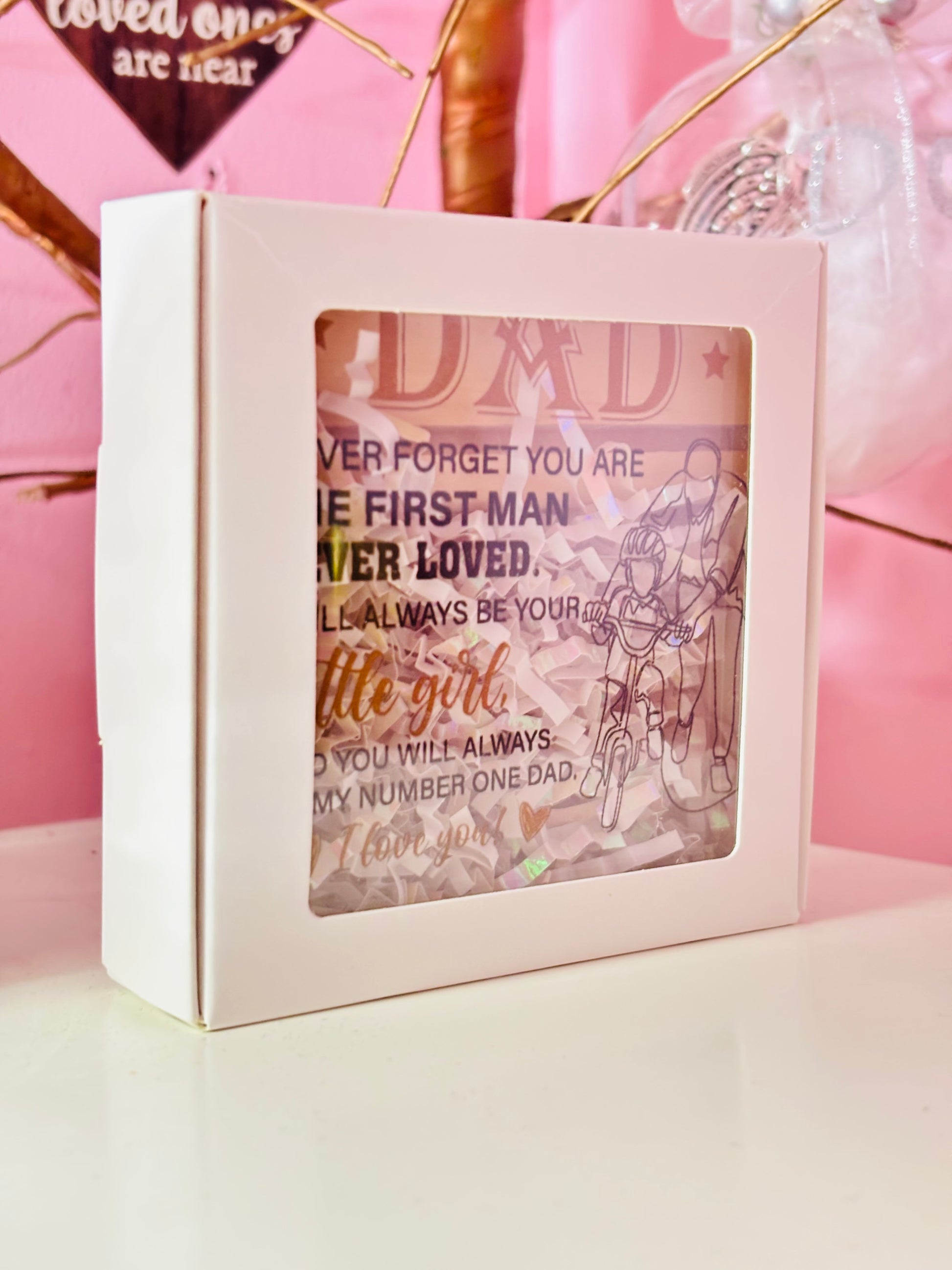 Gift box with a message for a father on a pink background