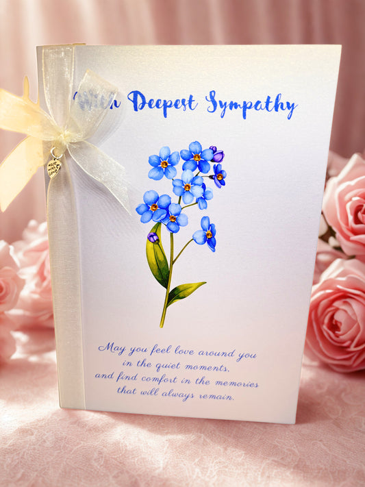 With Deepest Sympathy card with forget me nots illustraion and ribbon and rhinestone detail