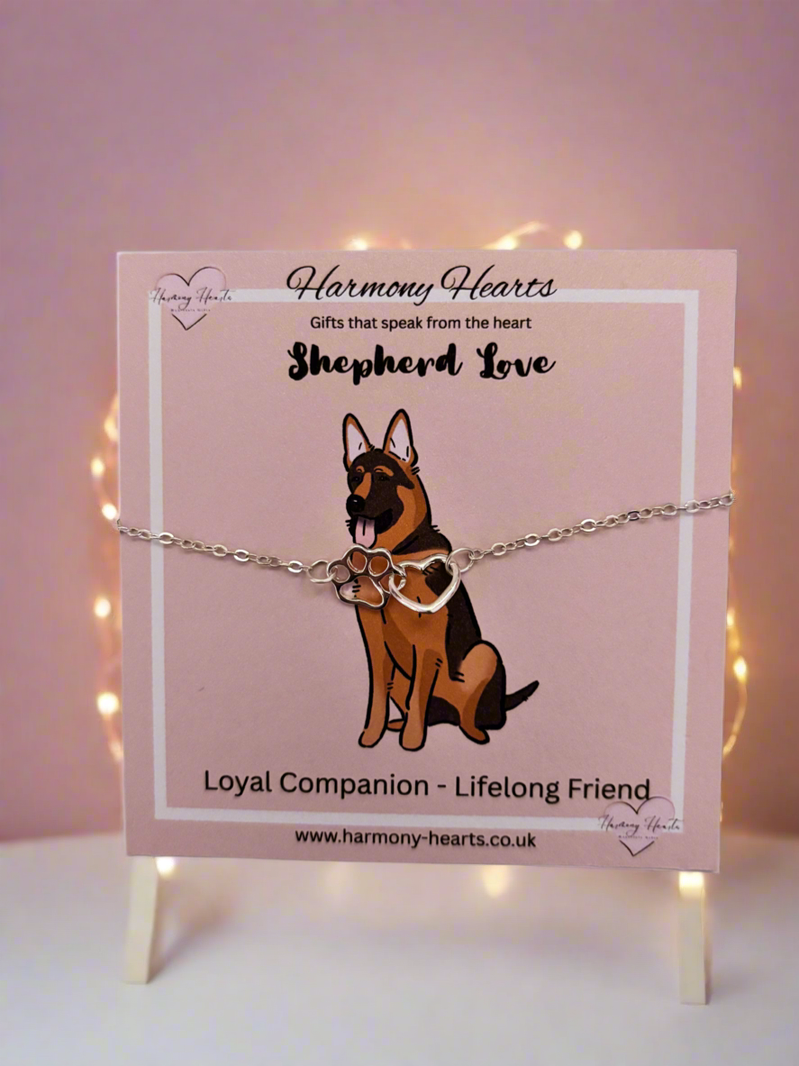 Dog-themed bracelet on a card with 'Harmony Hearts' branding