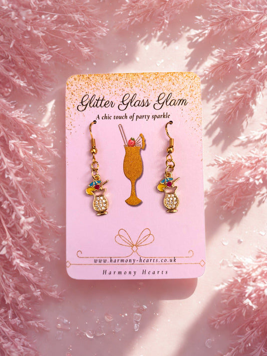 Pair of Cocktail glass earrings on a 'Glitter Glass Glam' card with a pink background