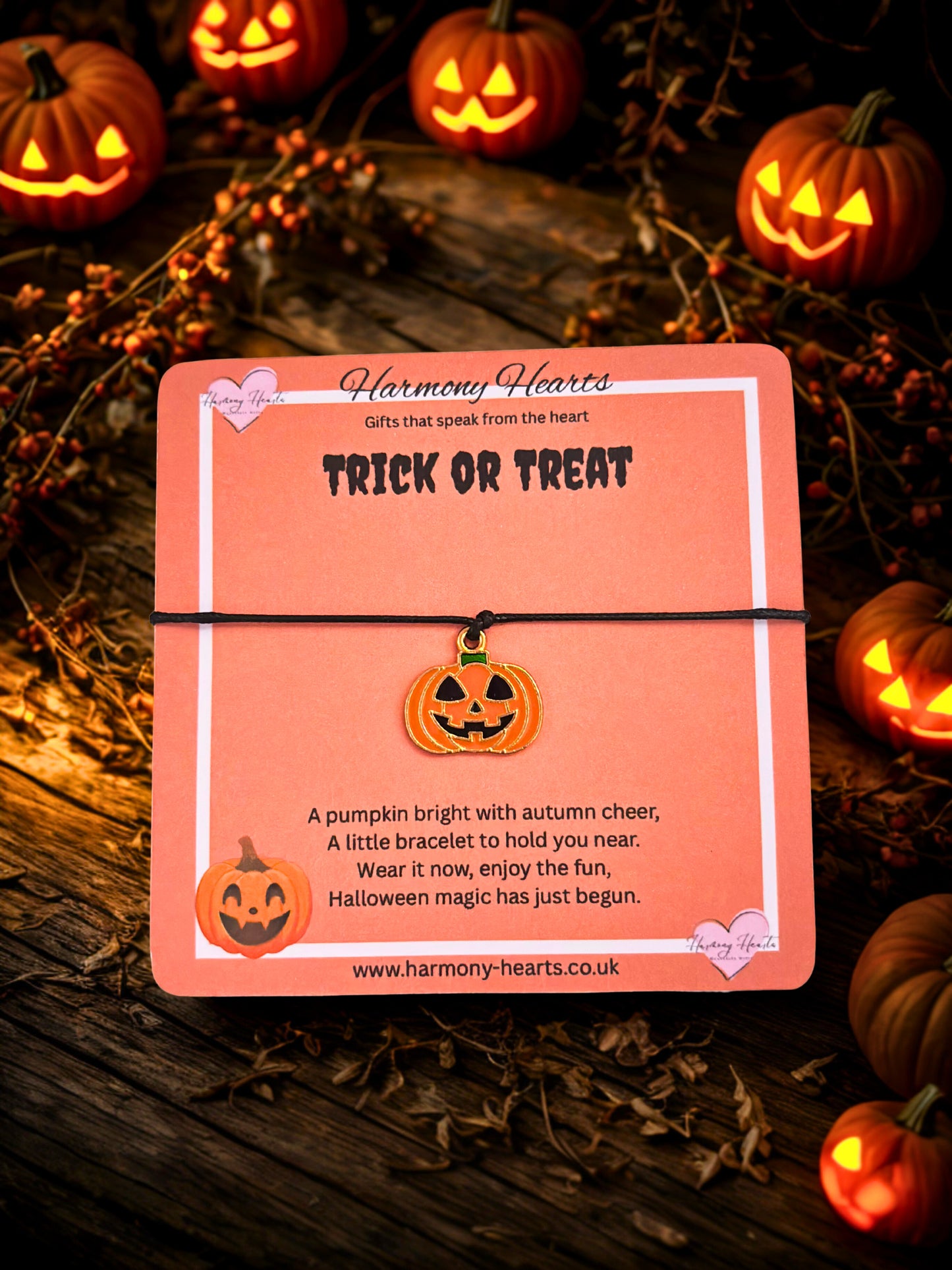 Halloween-themed bracelet packaging with pumpkins and 'Trick or Treat' text on a dark background.