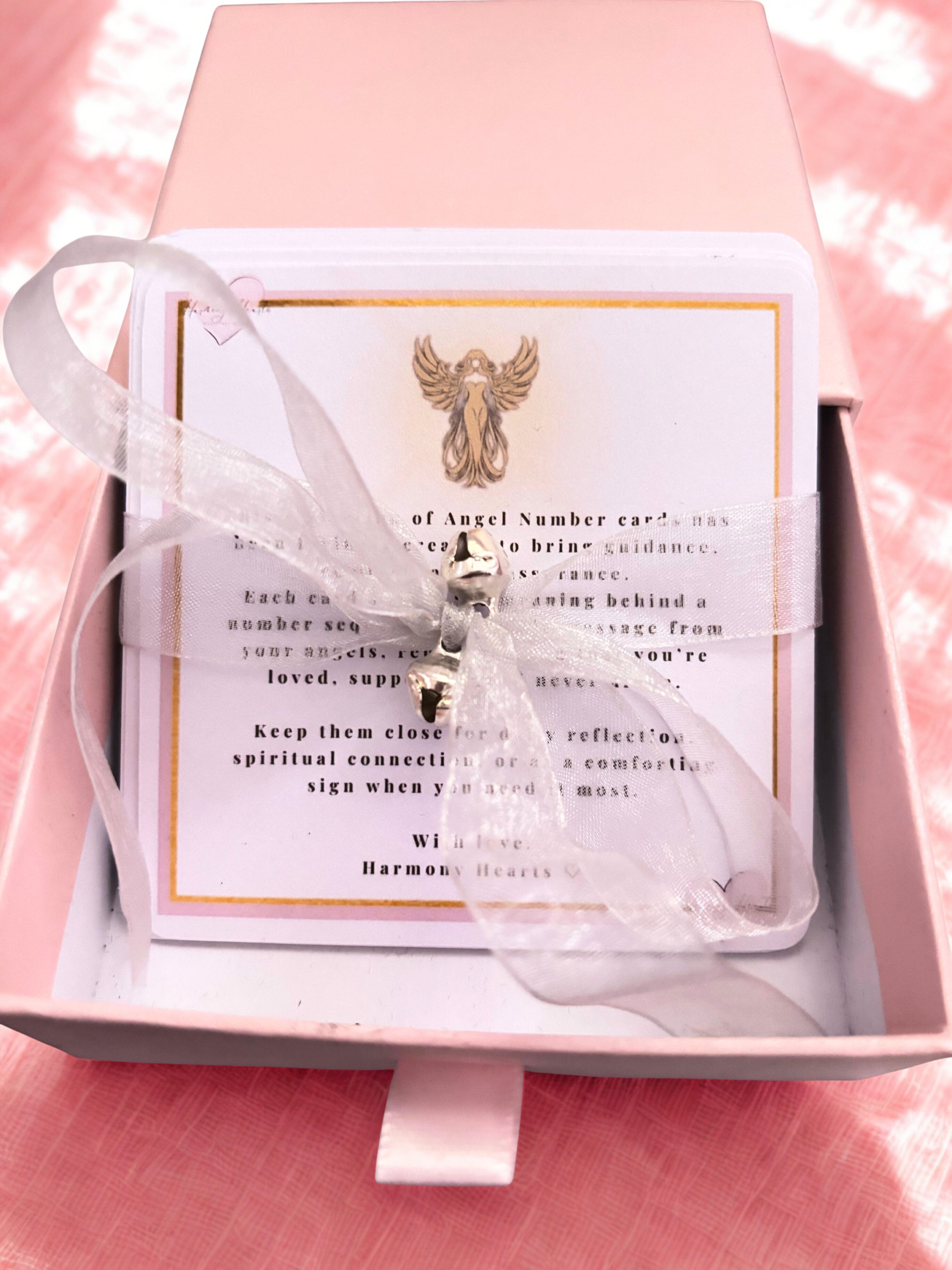 Set of angel number cards in a keepsake box