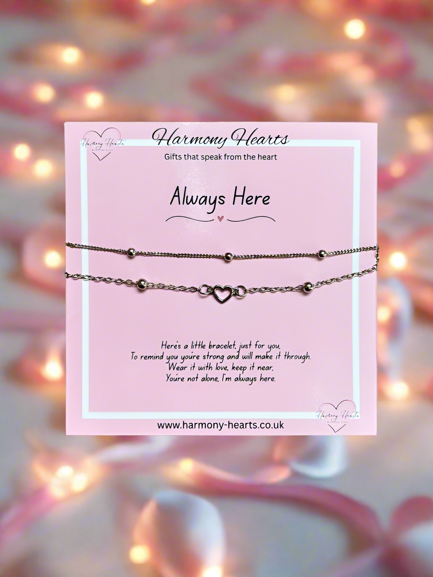 Bracelet on a card with 'Harmony Hearts' branding and a blurred background