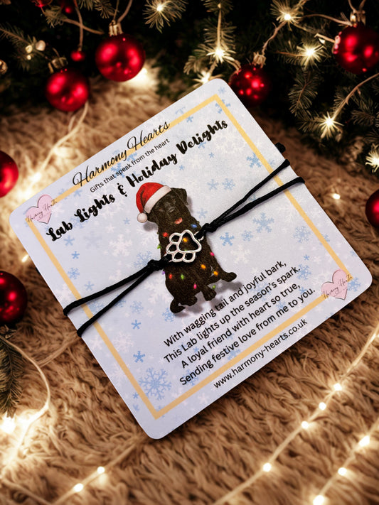 Labrador card with paw print bracelet under a Christmas tree