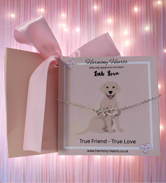 Labrador-themed bracelet in a gift box with 'Harmony Hearts' branding.