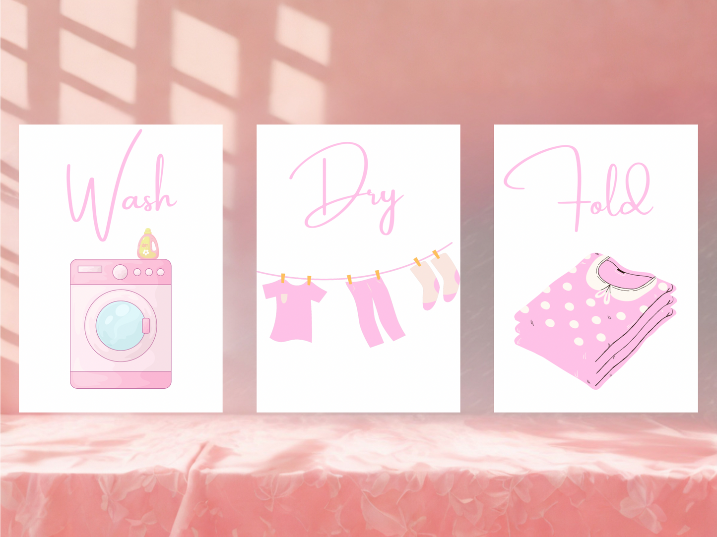 Three pink-themed laundry art prints with washing machine, clothesline, and folded clothes on a pink background.
Wash, dry, fold
