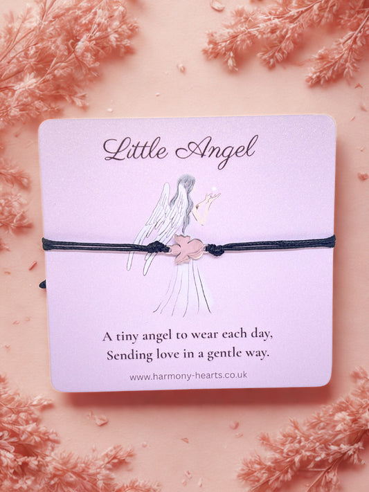 Little Angel bracelet on a card with floral background