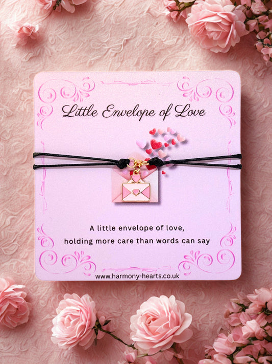 Pink Envelope charm with 'Little Envelope of Love' card on a pink floral background