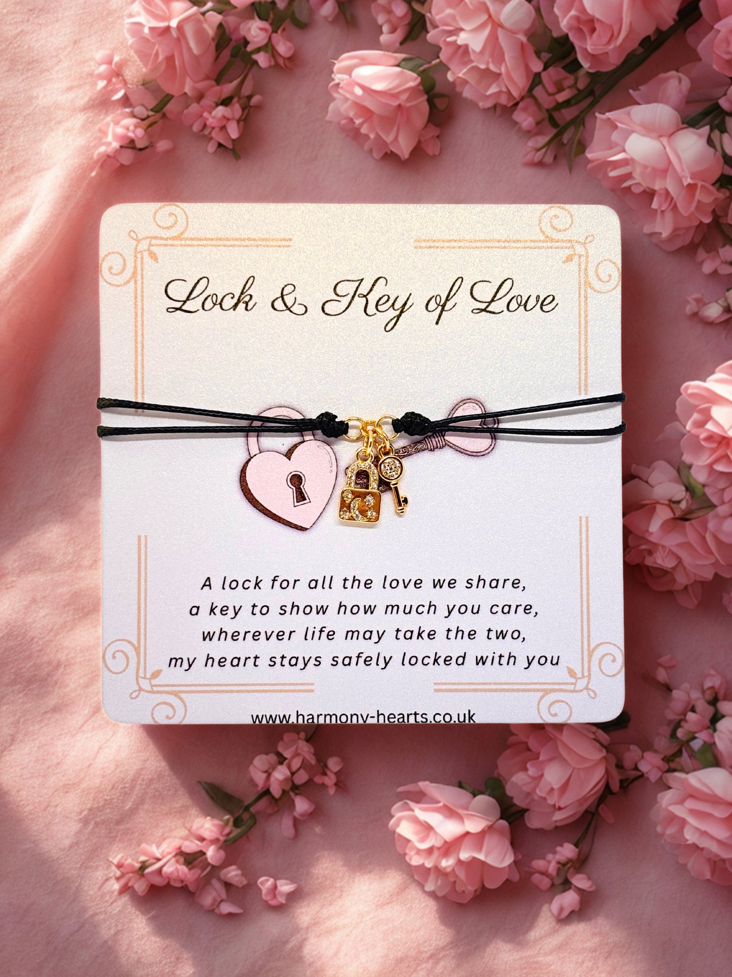 Lock and key of love charm bracelet on Harmony Hearts branding card