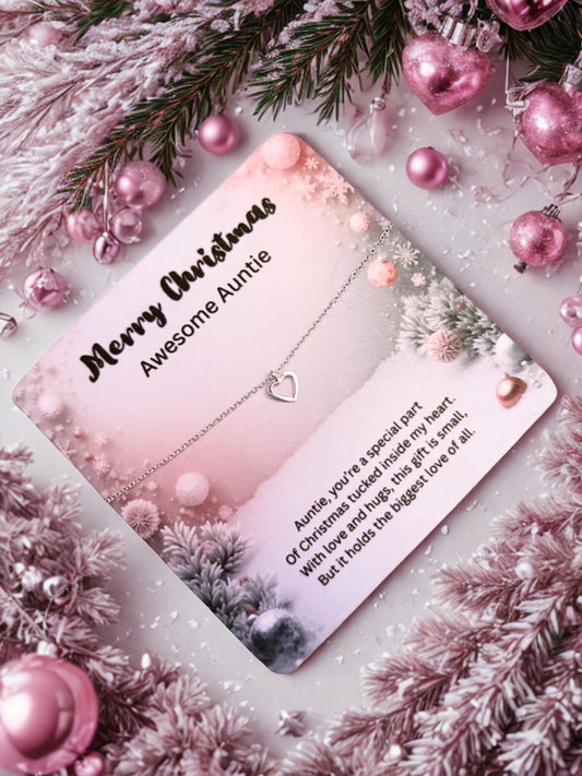 Silver heart bracelet on a Greeting card with 'Merry Christmas Awesome Auntie' message surrounded by festive decorations.