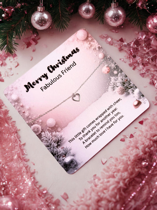 Silver heart bracelet on a Christmas card with fabulous friend and decorative elements on a pink background