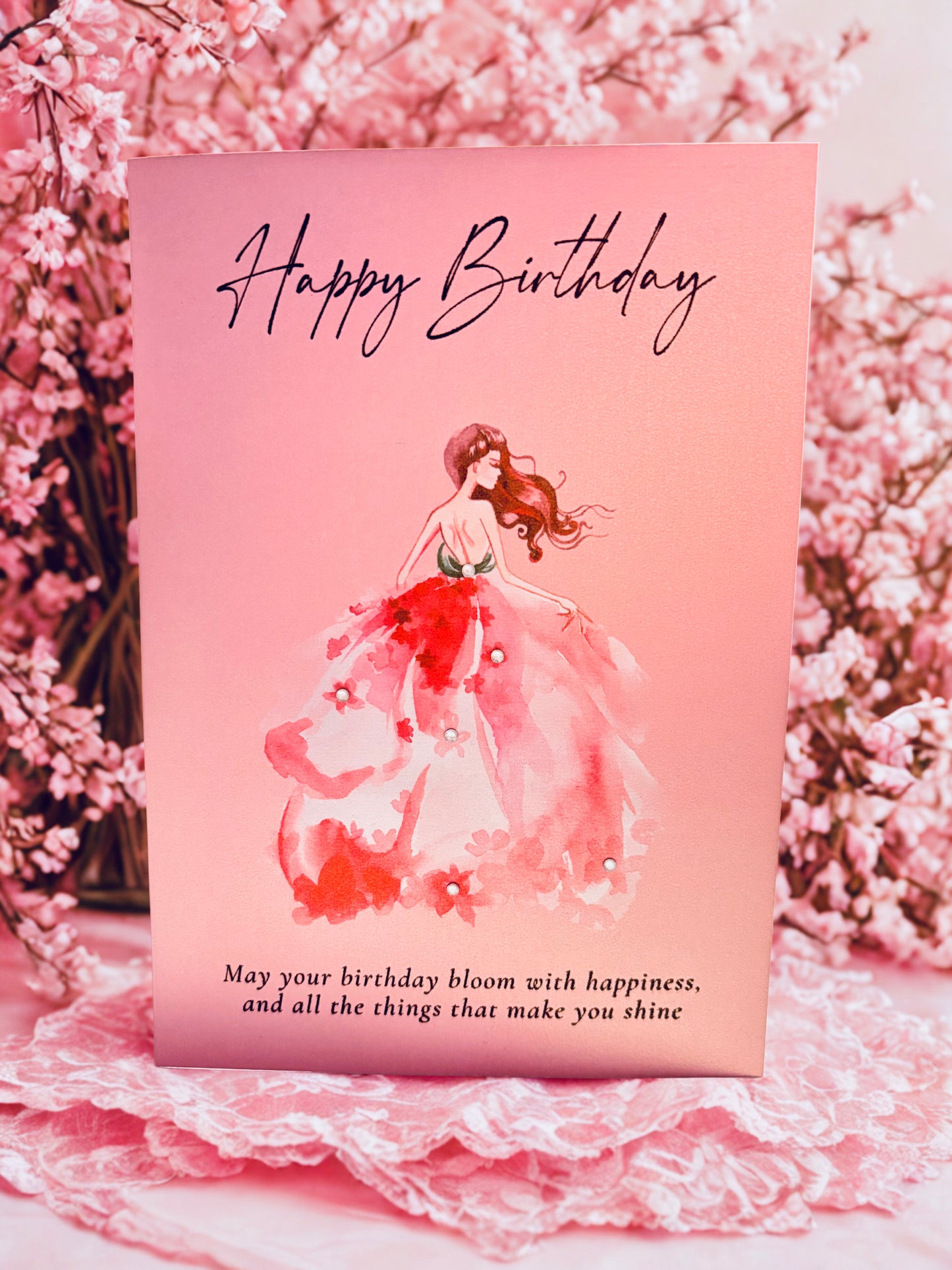 Pink birthday card with lady wearing a long pink ballgown dress