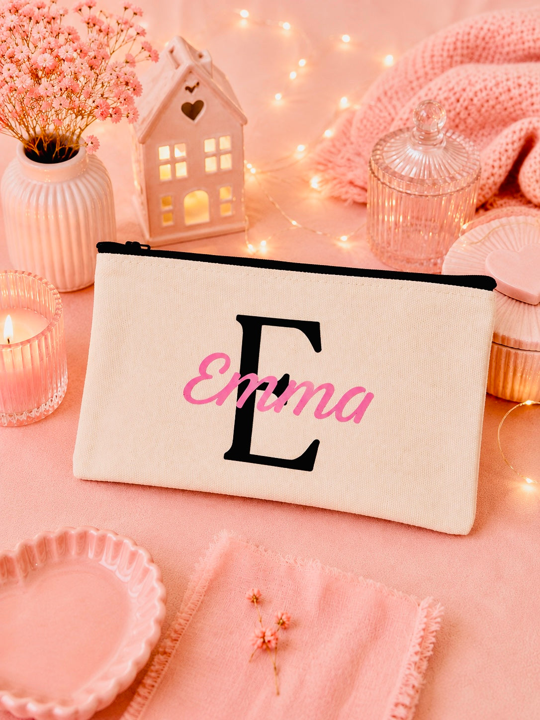 Canvas pencil case with personalised name and initial. Text with a black E and Emma in pink