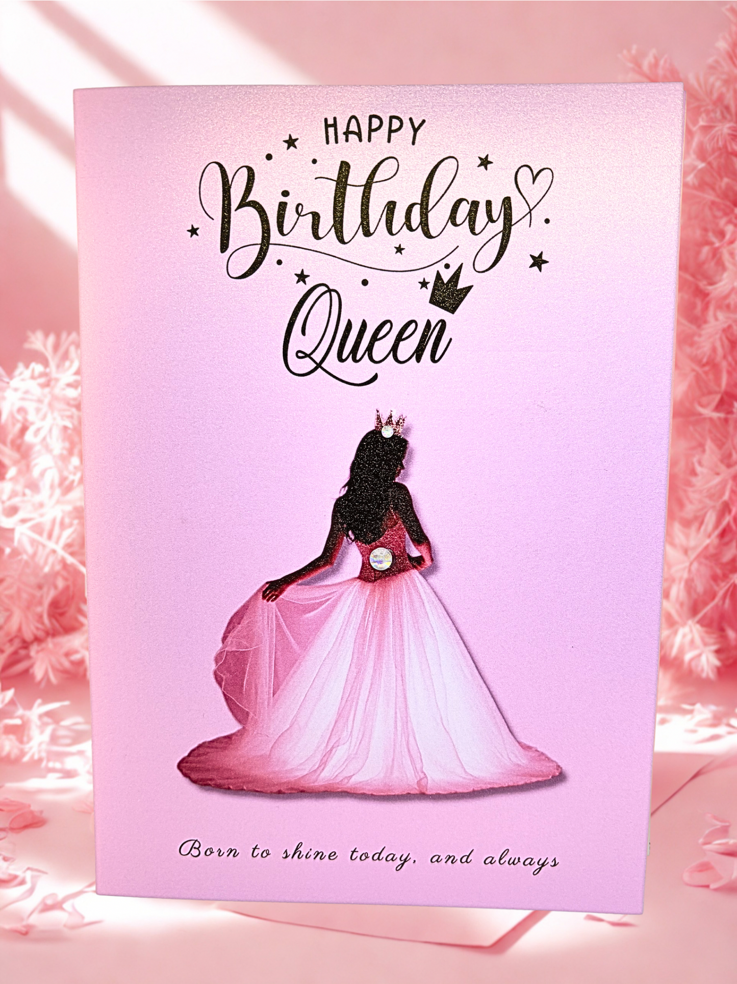 Birthday card for a queen with a pink background and a silhouette of a woman in a gown.