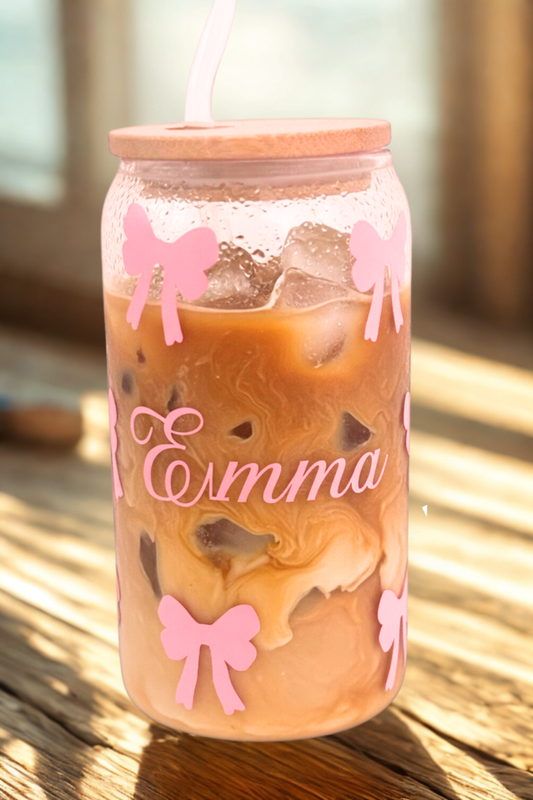 Glass with bows and name Emma filled with iced coffee 