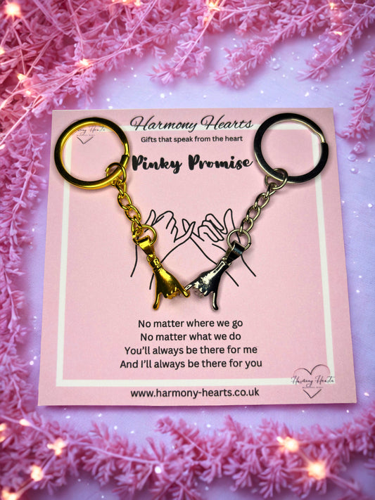 Keychain with heart design on a pink card with decorative pink background