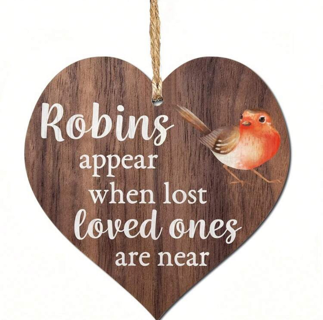 A wooden heart-shaped plaque with a jute twine hanging string, featuring an illustration of a robin and the message 'Robins appear when lost loved ones are near'.