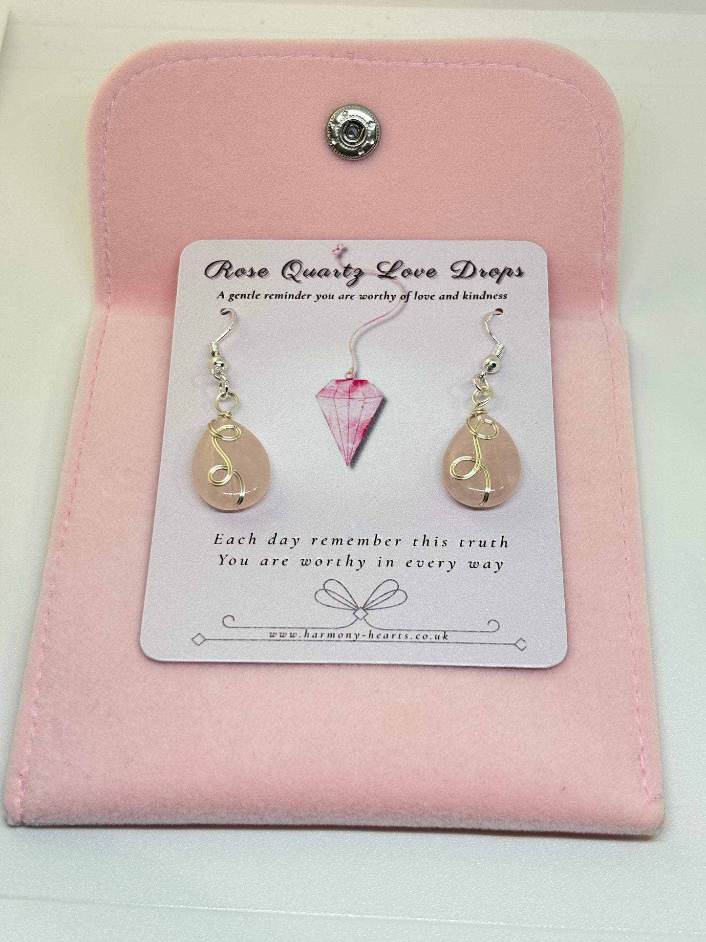 Rose quartz Earrings on a card with pink case