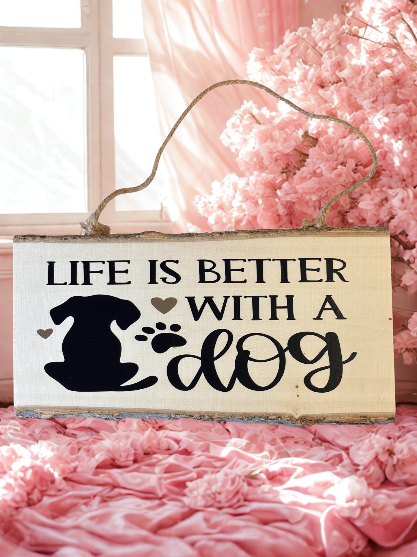 Rustic wood sign with the text Life is better with a dog and a dog image