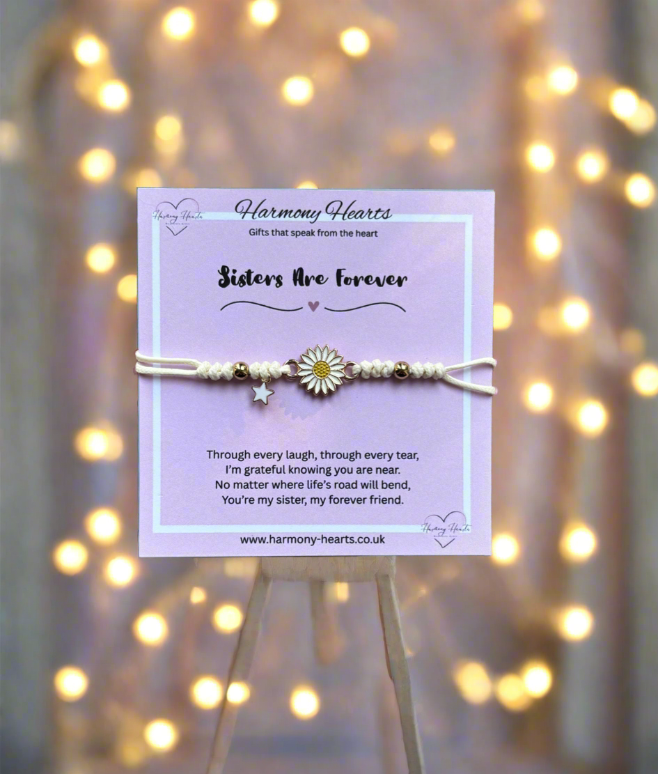 Bracelet on a stand with 'Harmony Hearts' card against a blurred light background