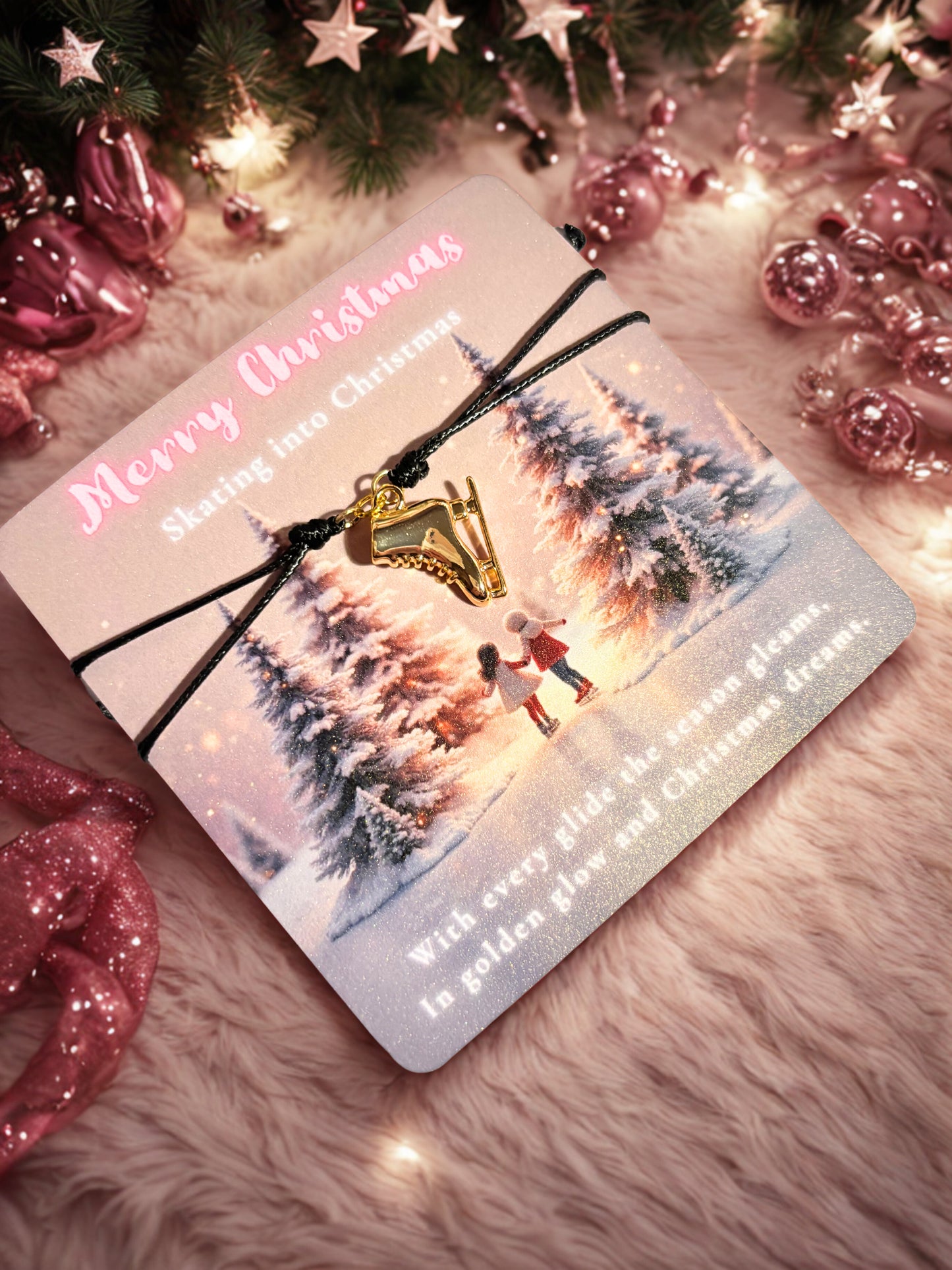 Christmas card with a gold ice skate charm on a festive background
