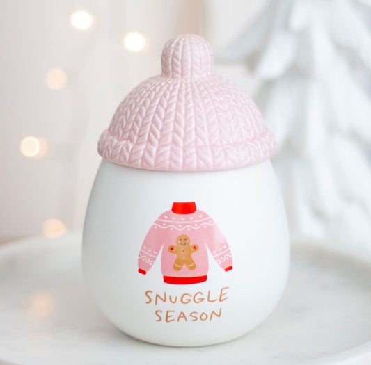 Oil burner with bobble hat and gingerbread design on a jumper