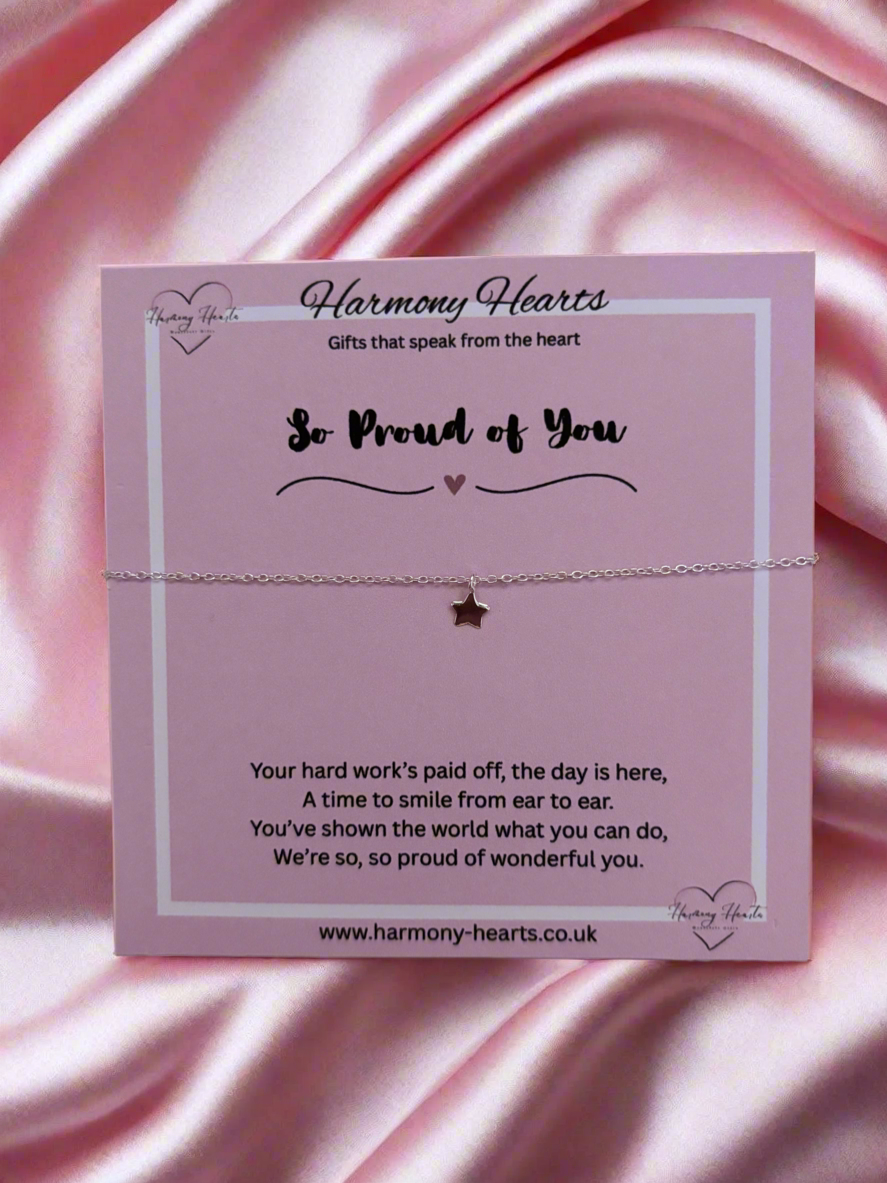 Star bracelet on a 'Harmony Hearts' card with a pink satin background